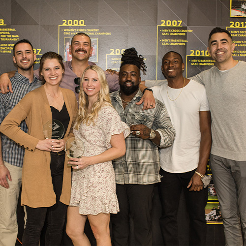 From left to right: Alex Rudd '13, Madison (Ekis) Anema '14, Dakota Downs '13,  Jenna (Jorgenson) Haley '14, ABSN '16, DeLaun Frazier '15, Ed Willis '12, and Tom Granado '12.